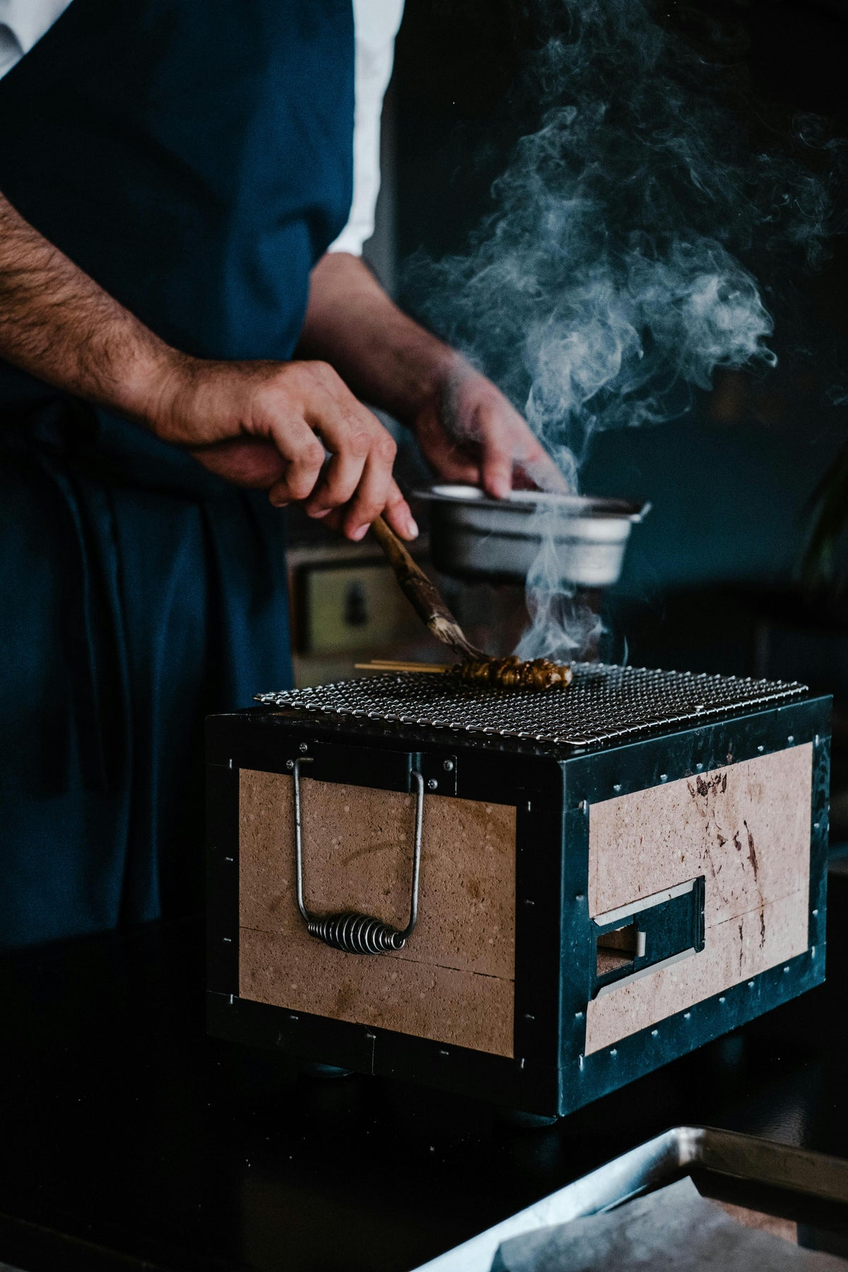 The Science of Charcoal vs. Wood in Professional Kitchens